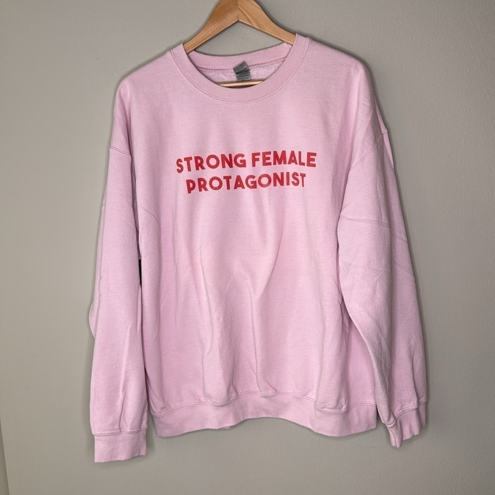 Gildan Strong Female Protagonist Crewneck Pullover Sweatshirt in Pink Size XL